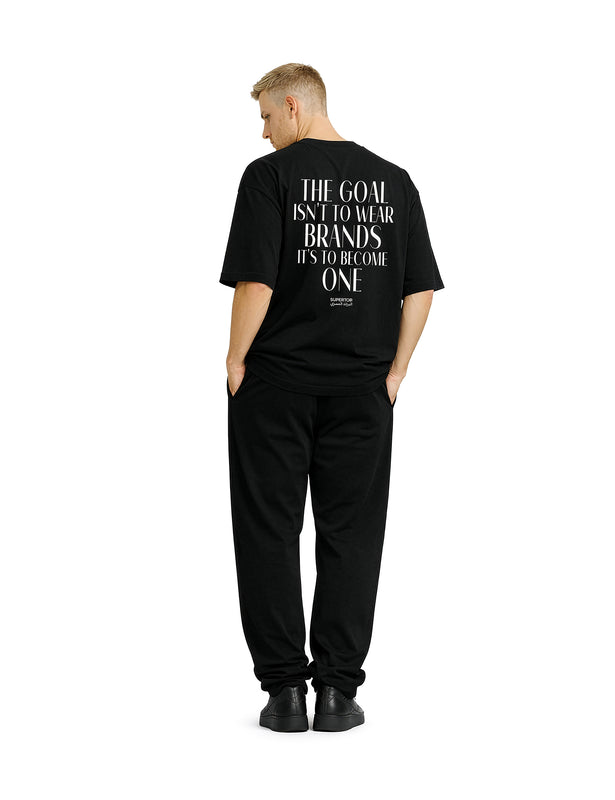 THE GOAL ISN'T TO WEAR BRANDS